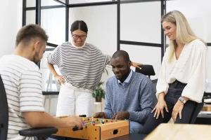close-up-people-having-fun-while-playing-table-soccer copy